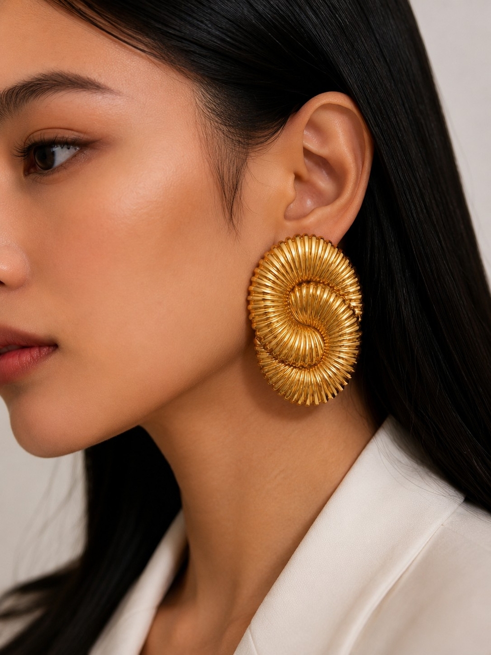 Elegant Gold Sculpted Swirl Earrings for Women - Picture 4 of 4